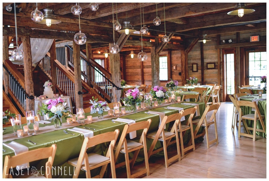 Tables decorated in pink and green inside of Pat's Barn.